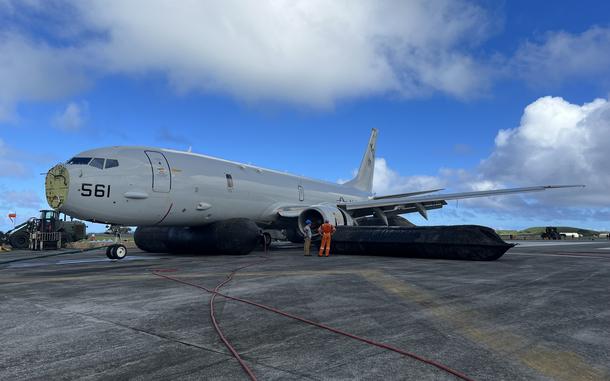 The P-8A Poseidon sits on the runway of Marine Corps Air Station Hawaii, Kaneohe Bay, Dec. 3, after a multidisciplinary team of military and civilian experts carefully raised the aircraft from Kaneohe Bay, Dec. 2.  The operation began at 6:30 a.m, Dec. 2.  The aircraft was floated adjacent to the runway by 10:18 a.m. And the last portion of the airframe, the nose wheel, lifted out of the water at 7 p.m., Dec. 2. (Photo courtesy of U.S. Navy)