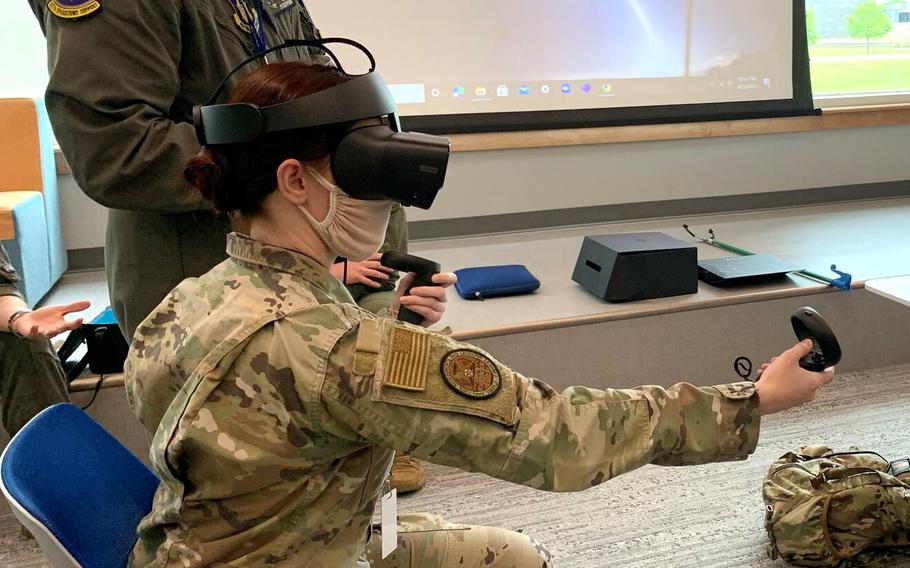 Maj. Brandon Wolf guides a United States Air Force student through our VR training program at STRIKEWERX.
