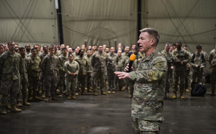 Army Chief of Staff Gen. James McConville addresses soldiers from the 101st Airborne Division at Mihail Kogalniceanu Air Base, Romania, during his visit on Dec. 16, 2022. About 5,000 soldiers from the division are operating in Europe, with the bulk of the force anchored in Romania.