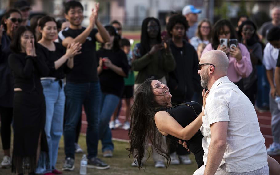 Yarelis Coss and Aaron Ferguson perform a dance demonstration during a Hispanic Heritage Month celebration at Marine Corps Air Station Iwakuni, Japan, Oct. 13, 2023.