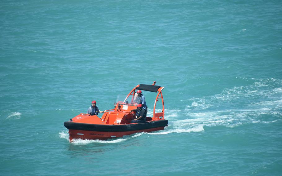 A fast rescue boat from the USNS Millinocket heads out to assist sailors in distress near Darwin, Australia, Aug. 8, 2023. 