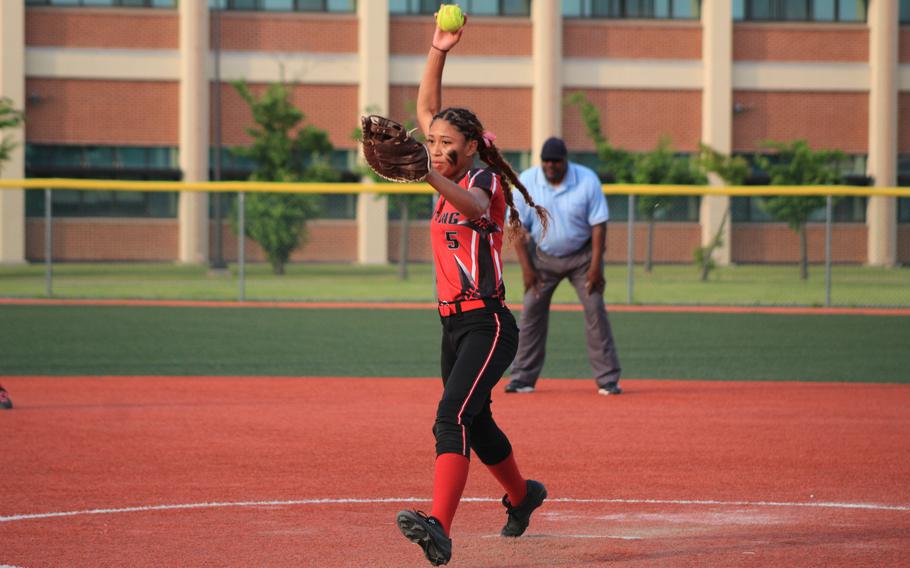 King right-hander Mila Nishimura-Reed delivers against Perry.