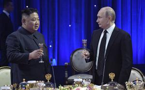 In this photo from April 25, 2019, Russian President Vladimir Putin and North Korean leader Kim Jong Un attend a reception following their talks at the Far Eastern Federal University campus on Russky island in the far-eastern Russian port of Vladivostok.