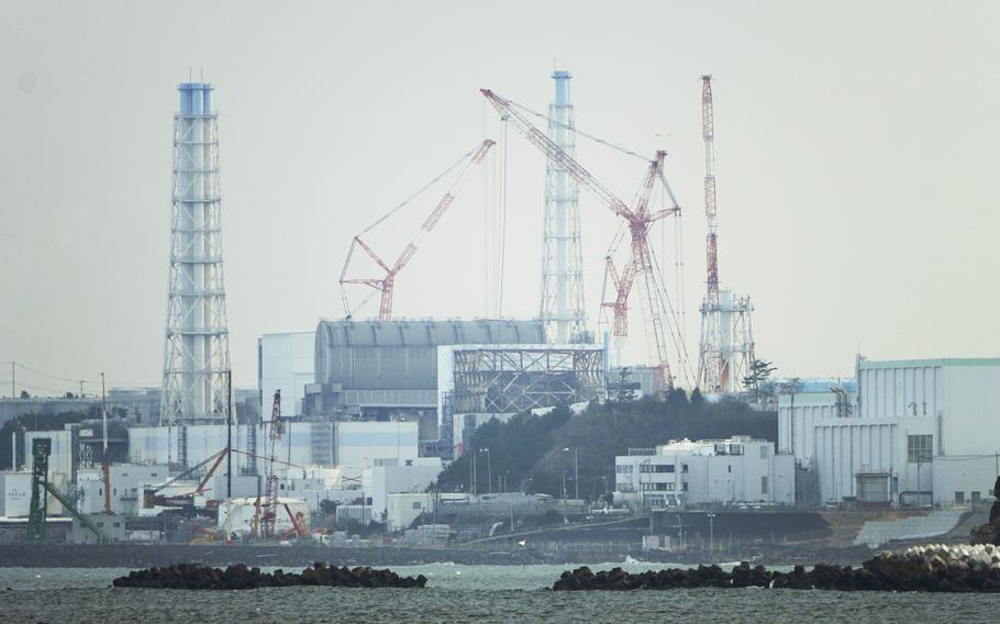 The Fukushima Daiichi nuclear power plant sits in coastal towns of both Okuma and Futaba, as seen from the Ukedo fishing port in Namie town, northeastern Japan, Wednesday, March 2, 2022. The head of a U.N. nuclear agency task force assessing the safety of Japan's plan to release treated radioactive water from the wreaked Fukushima nuclear plant into the sea said Friday, Jan. 20, 2023, that Japanese regulators have shown their commitment to comply with international safety standards.