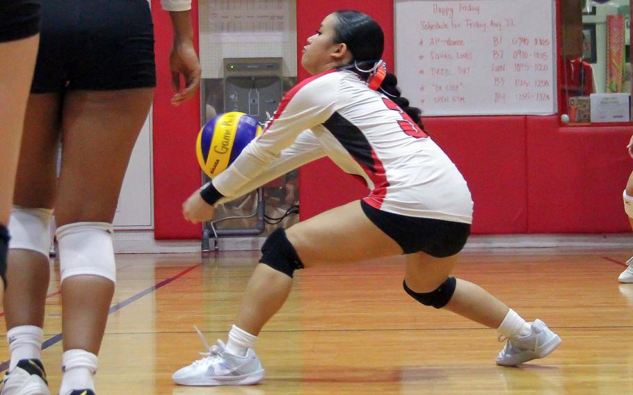 Lindsey Andrade bumps the ball.
