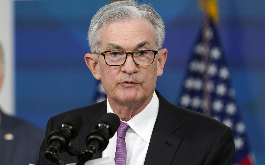 FILe - Federal Reserve Chairman Jerome Powell speaks during an event in the South Court Auditorium on the White House complex in Washington, on Nov. 22, 2021. Powell says that the appearance of a new COVID-19 variant could slow the economy and hiring. He also says it raises uncertainty about inflation. Powell says in remarks to be delivered to the Senate Banking Committee Tuesday that he recent increase in coronavirus cases and the emergence of the omicron variant pose downside risks to employment and economic activity and increased uncertainty for inflation.