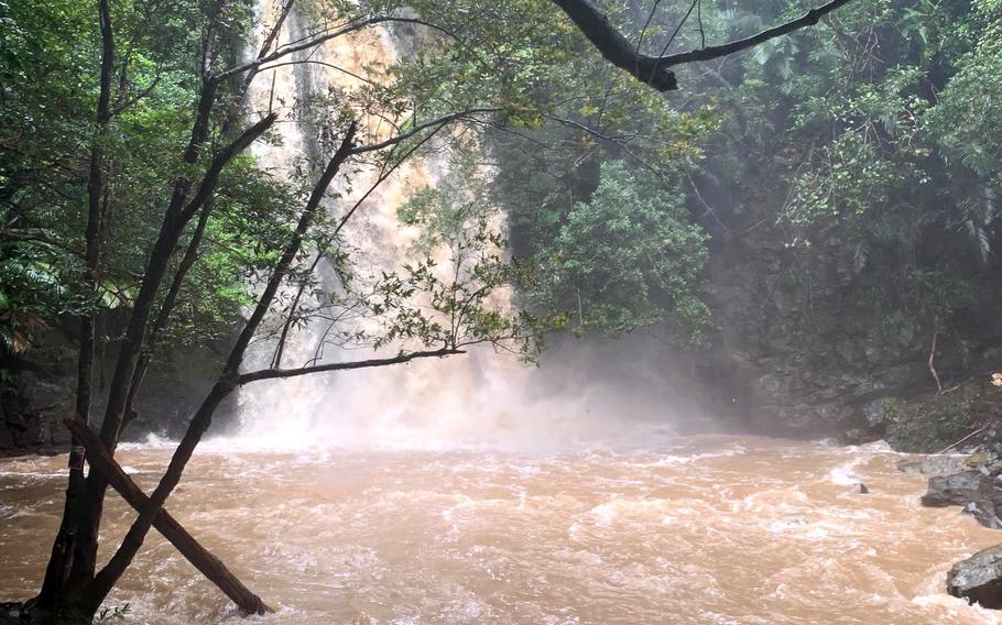 Water rages following a flash flood at Ta-Taki Falls, Okinawa, Sept. 13, 2020.