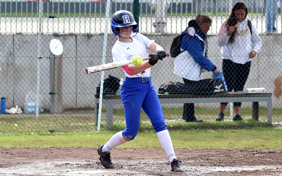 Rota’s Maya Petty hits a pitch from Naples’ Ariana Lopez during the Division II/III DODEA European championship game on May 24, 2024, at Kaiserslautern High School in Kaiserslautern, Germany.