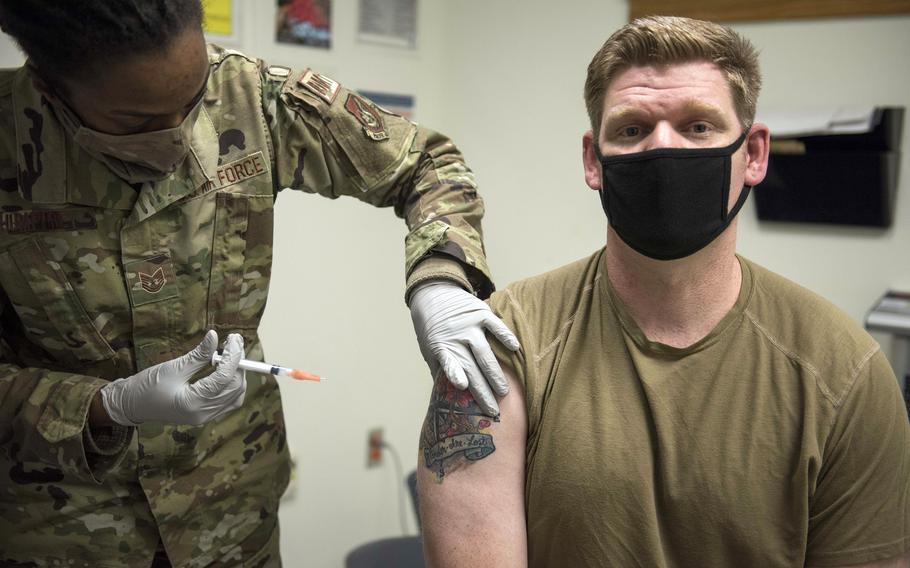 A service member receives the Moderna COVID-19 vaccine late last year at Kunsan Air Base, South Korea. Off base, 32% of the country’s 51 million residents have received the first dose of a vaccine as of Wednesday, July 21, 2021. 