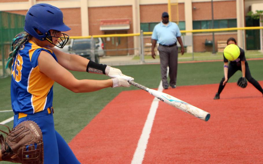 Yokota's Claire Smith tags the ball against Perry.