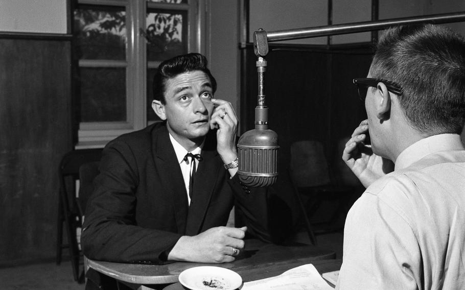 Johhny Cash, music star and Air Force veteran, being interviewed at Frankfurt’s AFN Studios.