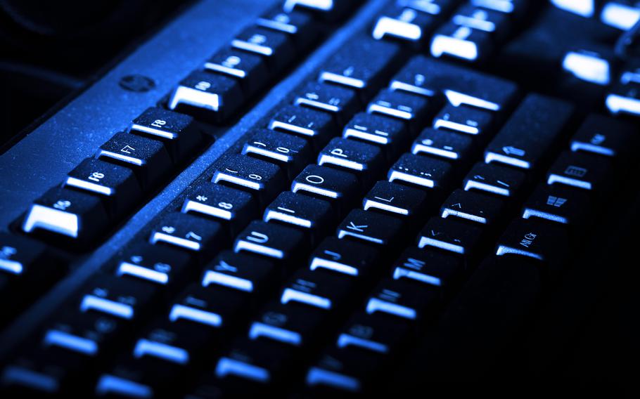 A lightly lit keyboard.