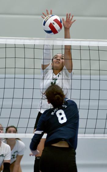 Naples' Aiyana Godfrey, top, blocks an attack from Black Forest Academy's Madeline Svanda during pool play of the DODEA European volleyball championships on Thursday at Ramstein High School at Ramstein Air Base, Germany.

Matt Wagner/Stars and Stripes