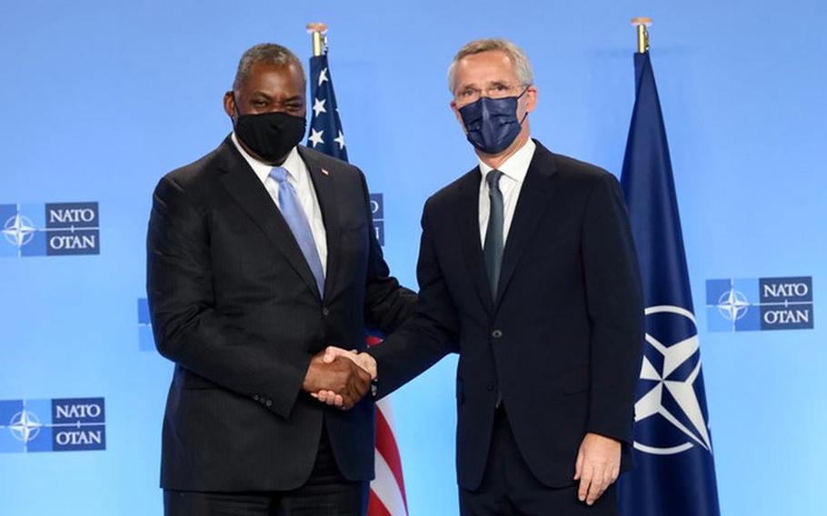 NATO Secretary-General Jens Stoltenberg welcomes U.S. Defense Secretary Lloyd Austin to the alliance’s headquarters in Brussels, Oct. 21, 2021. 