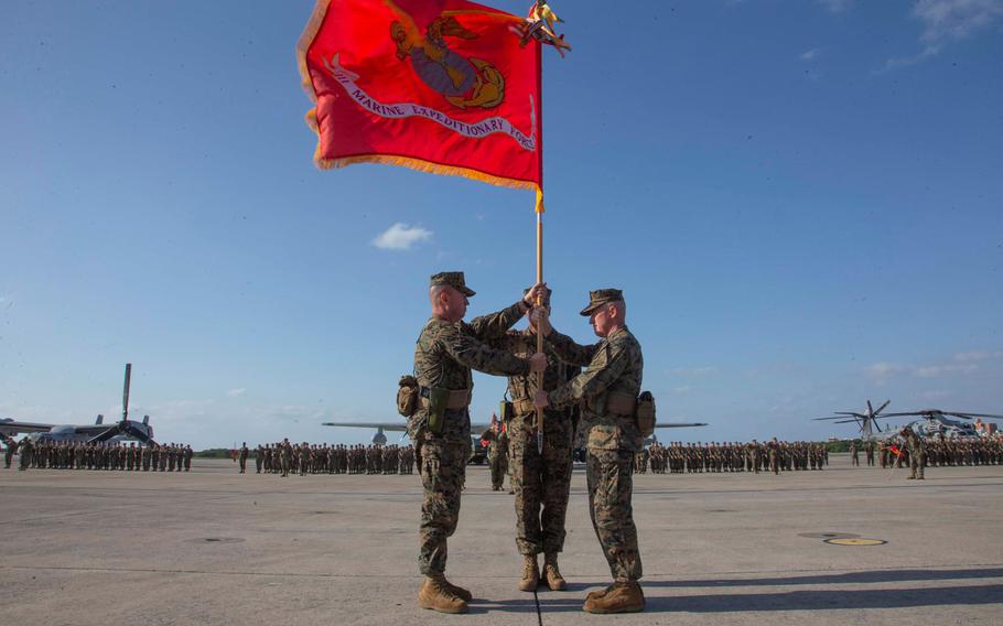 Lt. Gen. James Bierman, left, takes command of III Marine Expeditionary Force from Lt. Gen. H. Stacy Clardy III, right, at Marine Corps Air Station Futenma, Okinawa, Tuesday, Nov. 9, 2021.