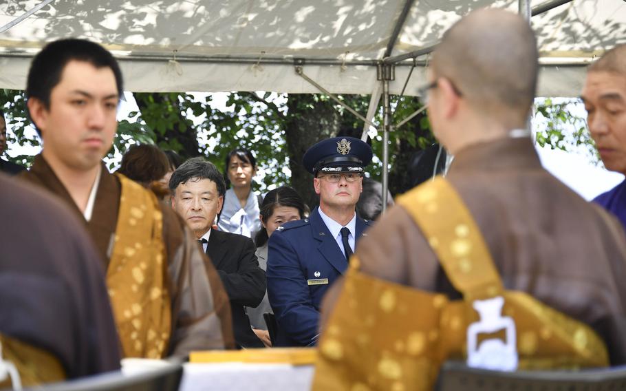 An Air Force colonel attends a ceremony honoring fallen World War II airmen and Japanese civilians.