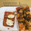 Bacaro della Pizza in Vicenza, Italy, serves pizza "al taglio," or by the slice, making it a rarity in town. 