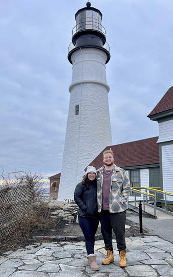 Shelby Merrill and Paul Armstrong, shown at the Portland Head Light in Cape Elizabeth, Maine, Feb. 2, met in 2022 at the University of Massachusetts, Amherst, through the Marriage Pact. The two, who live in separate Massachusetts towns, are planning their first overseas trip together, to Scandinavia. At 24 (Paul) and 23 (Shelby), they’re planning to move in together at some point but are in no rush to do so. 
