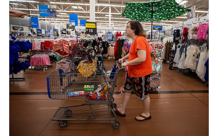 Violet Rin quickly moves through a store during a shopping trip. She said going out has become more stressful since new laws were signed to restrict the rights of transgender people. 
