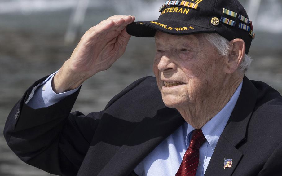 World War II Navy veteran Les Jones salutes as he’s recognized during the 20th anniversary celebration of the National World War II Memorial in Washington, D.C., May 25, 2024.