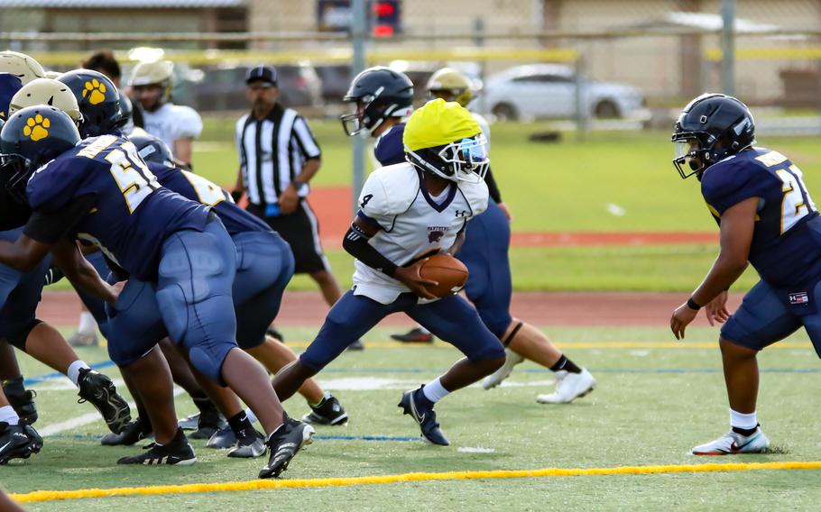 Junior quarterback Aaron Johnson and junior running back DeShawn Beard lead a group of experienced skills-positions players returning for Guam High, playing behind a line depleted by graduations.