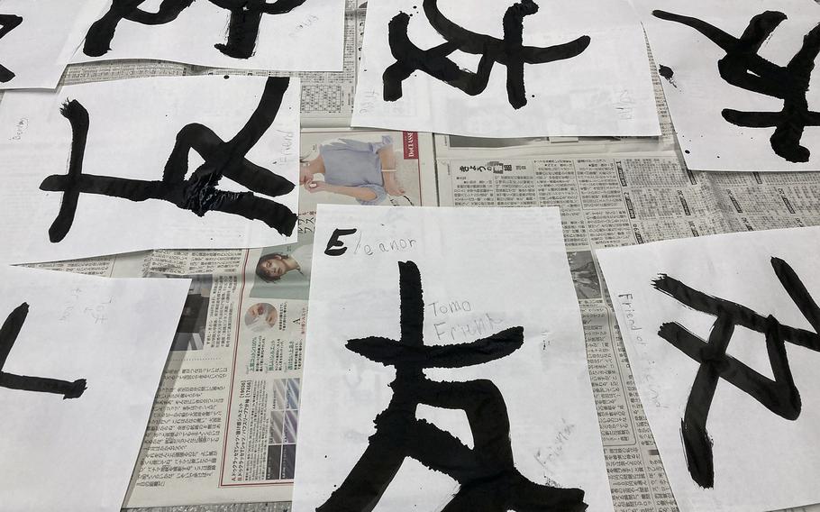 Students practiced Japanese calligraphy during the JaPANDAsia event at Joan K. Mendel Elementary School on Yokota Air Base, Japan, May 4, 2023.