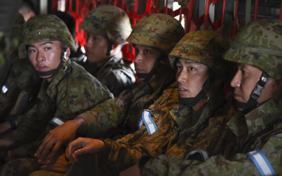 Japan Ground Self-Defense Force soldiers prepare for takeoff on an C-130J Super Hercules during a Valiant Shield exercise at Yokota Air Base, Japan, on Saturday, June 15, 2024. 