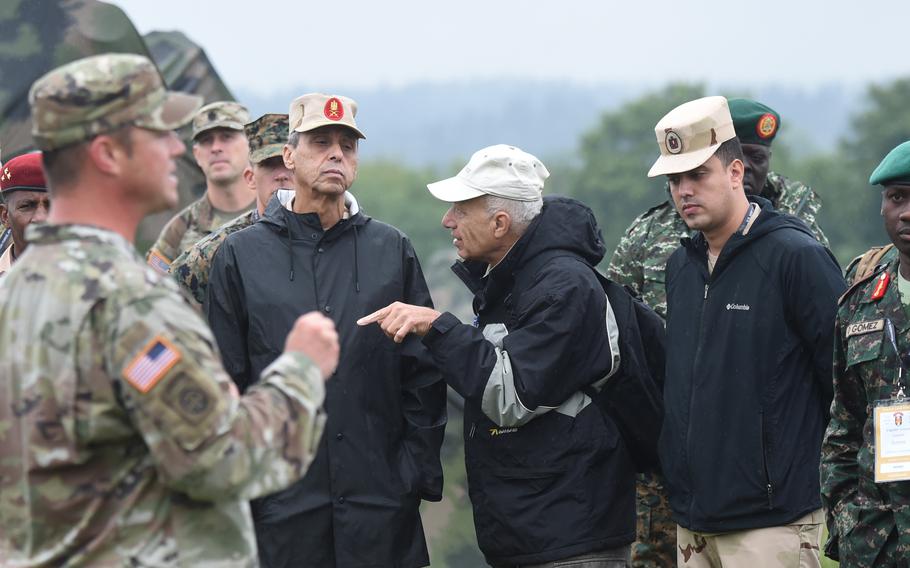 Members of the Egyptian delegation listen to what type of training they will be seeing on Sept. 14, 2022 at the Vilseck training area. Leaders watched as soldiers from the 2nd Cavalry Regiment completed testing for the Expert Infantryman Badge. 