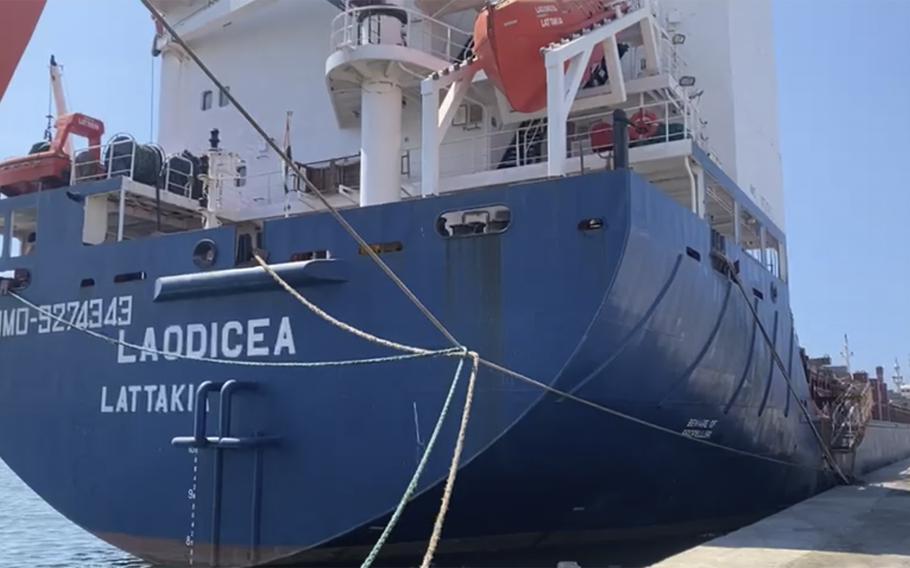 This frame grab from a video, shows a Syrian cargo ship Laodicea docked at a seaport, July 29, 2022, in Tripoli, north Lebanon. The office of Lebanon’s prosecutor general Tuesday, Aug. 1, 2022, allowed a Syrian ship said to be carrying Ukrainian grain stolen by Russia to leave a port in the country’s north, officials said, after an investigation showed it was not carrying stolen goods. However, the ship Laodicea cannot leave the port of Tripoli because a judge ordered Monday that it may not sail for 72 hours at the request Ukrainian authorities.