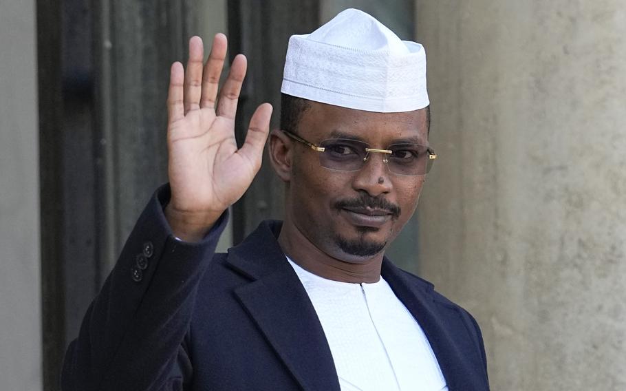 Chad’s Gen. Mahamat Idriss Deby, the head of its military government, waves as he is welcomed by French President Emmanuel Macron for a meeting at the Elysee Palace in Paris, Friday, Nov. 12, 2021. Deby met Saturday, Aug. 6, 2022, with the ruling emir of Qatar after months of talks over a possible peace deal between his forces and rebel factions in the African nation, negotiations hosted by Doha.