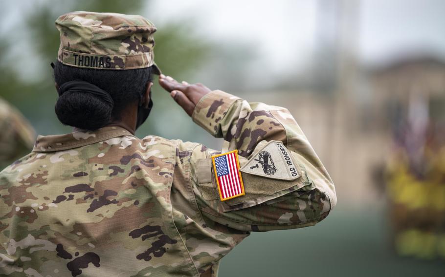 A soldier assigned to Kunsan Air Base, South Korea, salutes on Sept. 10, 2021.