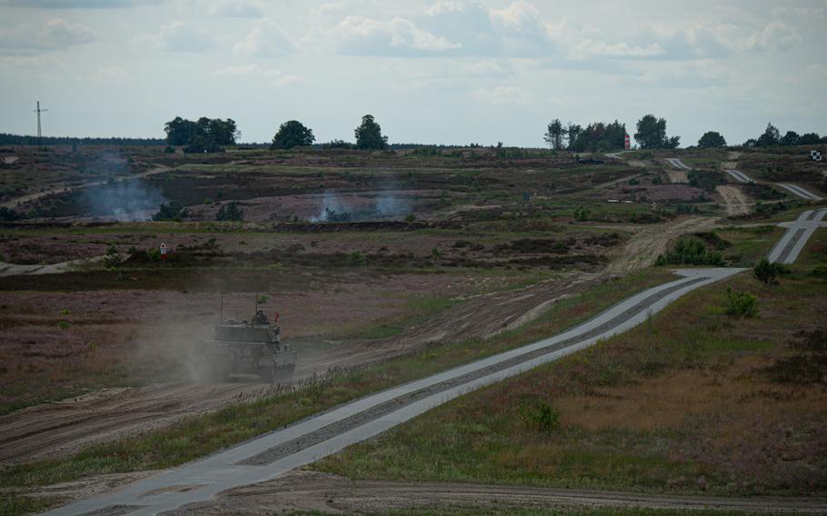 A Leopard 1 A5 tank driven by a Ukrainian crew rolls toward its targets on the training range near Klietz, Germany. To qualify, crews also have to shoot their main weapon during forward movement.