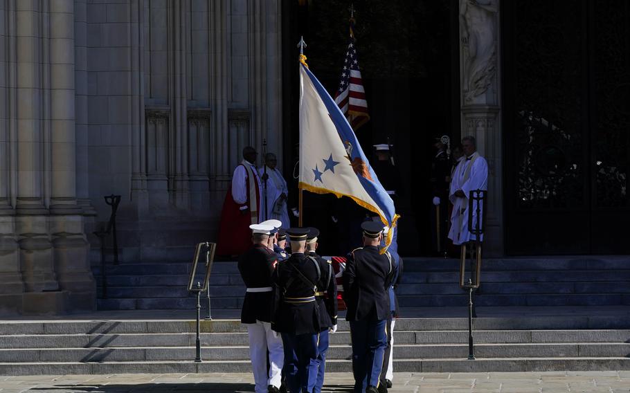 The flag-draped casket of former Secretary of State Colin Powell is carried into the Washington National Cathedral for a funeral service in Washington, Friday, Nov. 5, 2021.