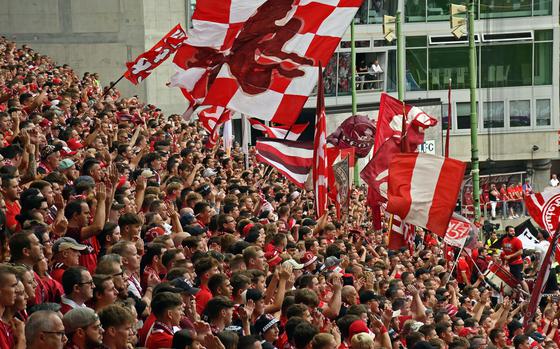 Supporters wave flags and cheer during an FC Kaiserslautern soccer game at Fritz Walter Stadium, Sunday, Aug. 28, 2022.