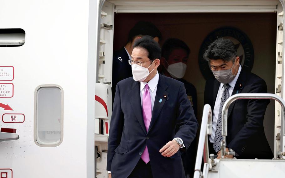 Prime Minister Fumio Kishida arrives at Haneda Airport on Friday afternoon, following his visits to Southeast Asia and Europe. 