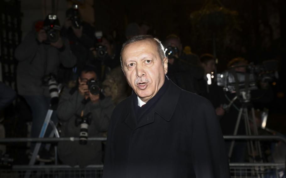 Recep Tayyip Erdogan, Turkey's president, departs following a multilateral meeting on the sidelines of the North Atlantic Treaty Organisation summit in London on Dec. 3, 2019. 