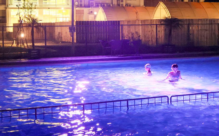 Visitors to Glamping & Port Yui enjoy swimming in the renovated former school pool. The pool was open until Sept. 30 this year. 