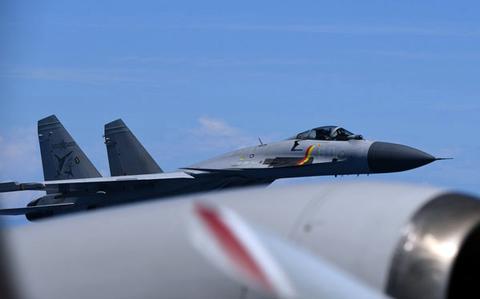 Chinese fighter skirts Japanese patrol plane during ‘unusual approach’