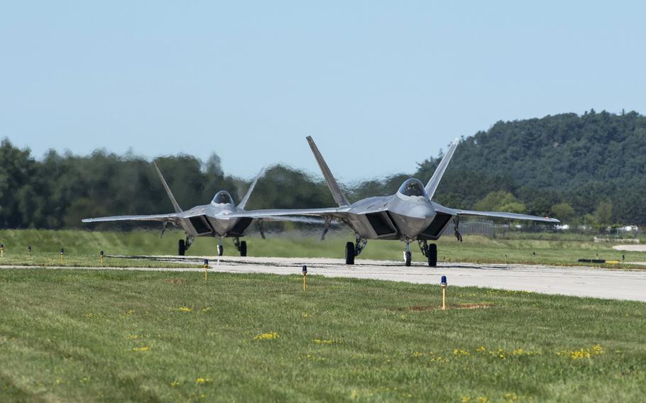 An F-22 Raptor assigned to the 1st Fighter Wing, Joint Base Langley-Eustis, Va., taxis after a training mission during the annual Northern Lightning exercise conducted at Volk Field Air National Guard Base, Wisconsin, Aug. 11, 2020. Northern Lightning is a full-spectrum Counterland training exercise hosted at Volk Field ANGB, providing a tailored, cost effective and realistic combat training for the Air National Guard and Total Force.