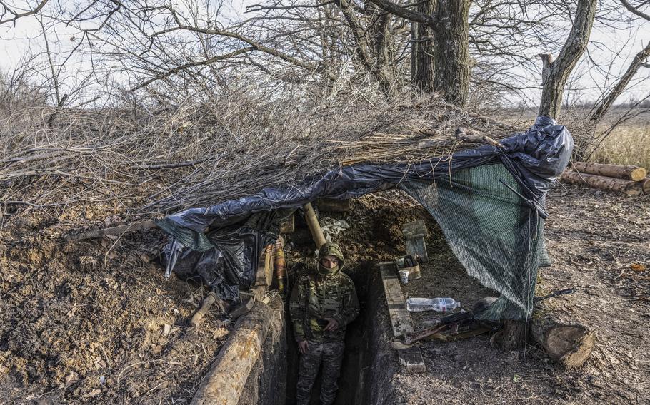 A Ukrainian soldier near a bunker entrance last year in the Zaporizhzhia region.