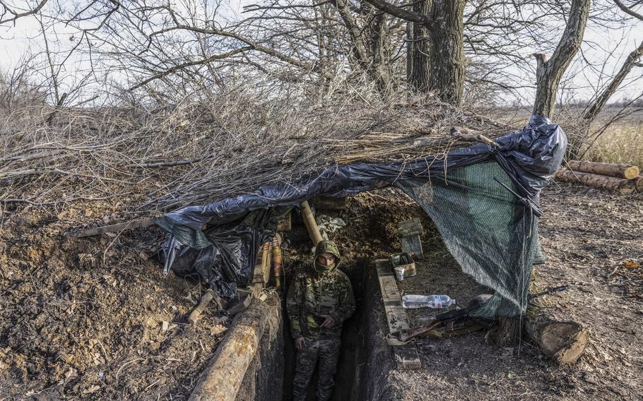 A Ukrainian soldier near a bunker entrance last year in the Zaporizhzhia region.