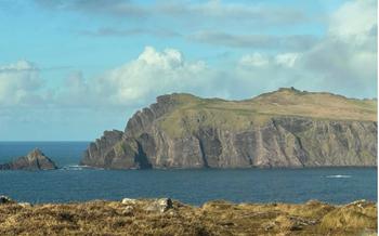 Irish landscape with hills and blue water on a sunny day