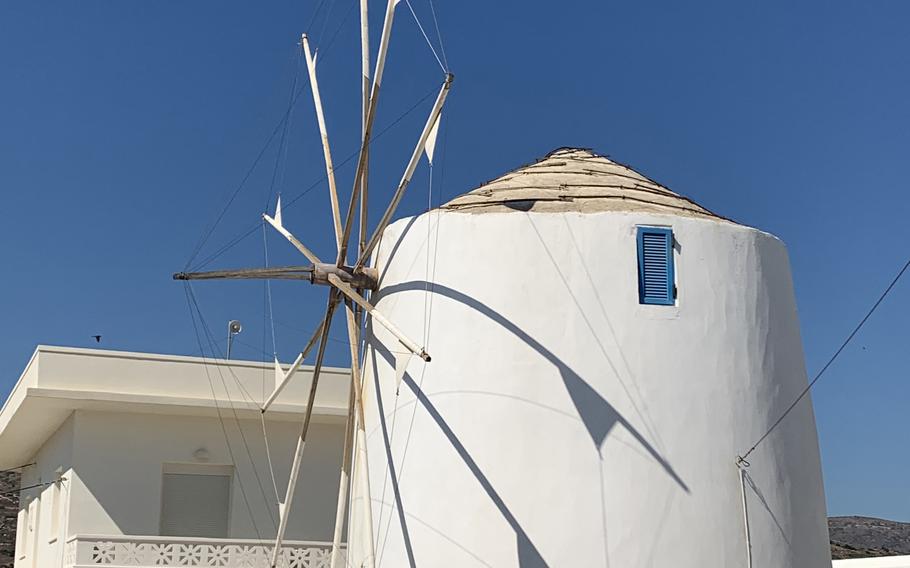 Windmills have become iconic in Paros and many other Greek Islands. This one acts as a round-about between villages. 