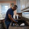 Don Allen practices mindfulness as he washes the dishes each afternoon at his St. Paul home. Allen is among the veterans who participated in a study of mindfulness exercises from 2020 to 2022 at the Minneapolis VA Medical Center. (Jeff Wheeler / The Minnesota Star Tribune)