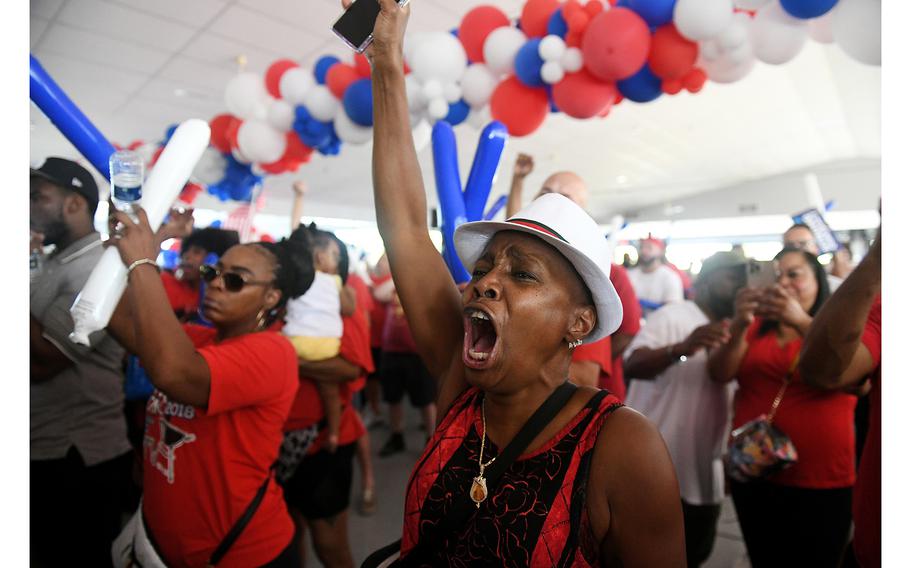 Local 228 member Nalesha Carter, 55, cheers during the remarks by UAW International President Shawn Fain at the UAW rally at Region 1 headquarters in Warren, Michigan, on Aug. 20, 2023. 