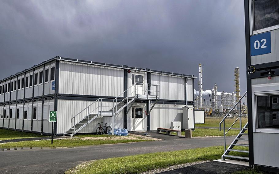 A container town waits to be inhabited by up to 5,000 workers from Asia. It stands on a filed near the Europes biggest petrochemical investment in expanding PKN Orlen refinery in Biala near Plock Poland, on Aug. 8, 2023. 