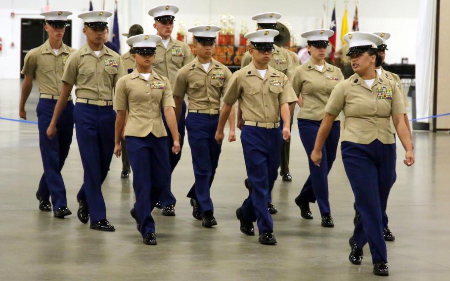 With Mia Vedsted in the lead, the Dragon Battalion of Kubasaki High School at Camp Foster, Okinawa, competes for a national JROTC title in Fredericksburg, Va., April 12, 2023.