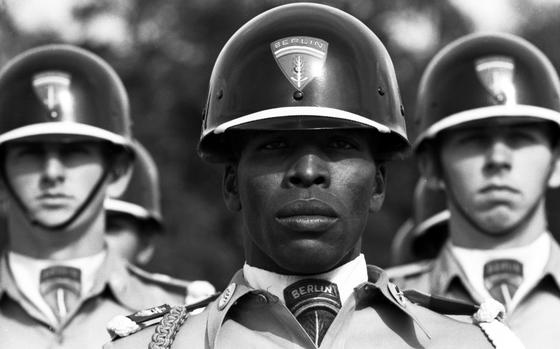 Berlin, Germany, September, 1961: Staff Sgt. Dallas A. Pinckney, center, of Tallahassee, Fla., stands at the front of the 2nd Battle Group Honor Guard that he was assigned to organize after arriving in Berlin in 1959. The troops' job was "to carry the national colors, escort VIPs, demonstrate weapons and uniforms, and put on close-order drill exhibitions unrivaled in precision" — all in their spare time from regular duties as riflemen in Company D during the crisis surrounding construction of the Berlin Wall. Pinckney, a Korean War veteran, had created a similar unit at Fort Lewis in the 1950s, and it was good enough to earn a spot on the Ed Sullivan Show.

Looking for Stars and Stripes’ historic coverage? Subscribe to Stars and Stripes’ historic newspaper archive! We have digitized our 1948-1999 European and Pacific editions, as well as several of our WWII editions and made them available online through https://starsandstripes.newspaperarchive.com/

META TAGS:  Black History Month; African American; Honor Guard; U.S. Army; 