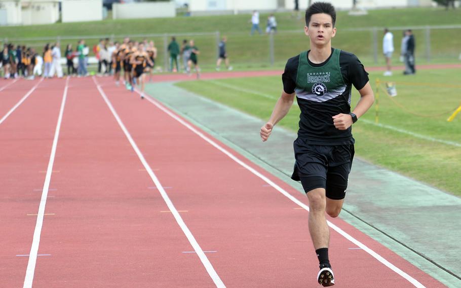 Kubasaki's Ryan Hater gets several legs up on the rest of the field in the 1,600 during Saturday's Okinawa track and field meet. Hater won both the 800 and 1,600.