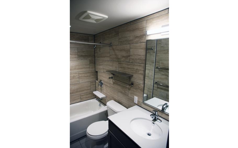 A newly renovated bathroom in one of 50 single-story duplexes nearing completion at Sebille Manor on Kadena Air Base in Okinawa, Japan.